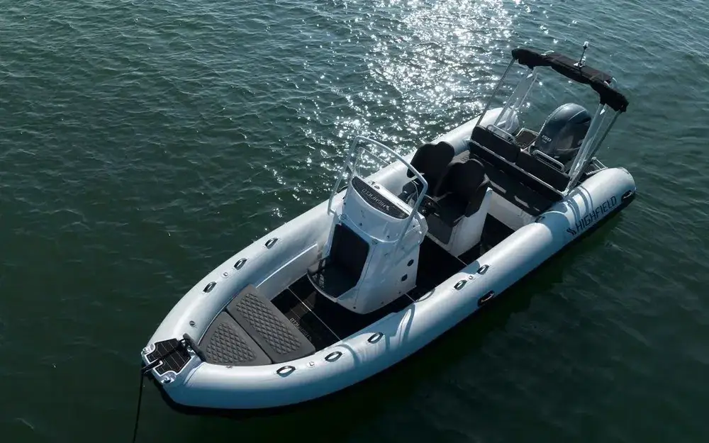 Highfield Sport 660 tender on dark blue water